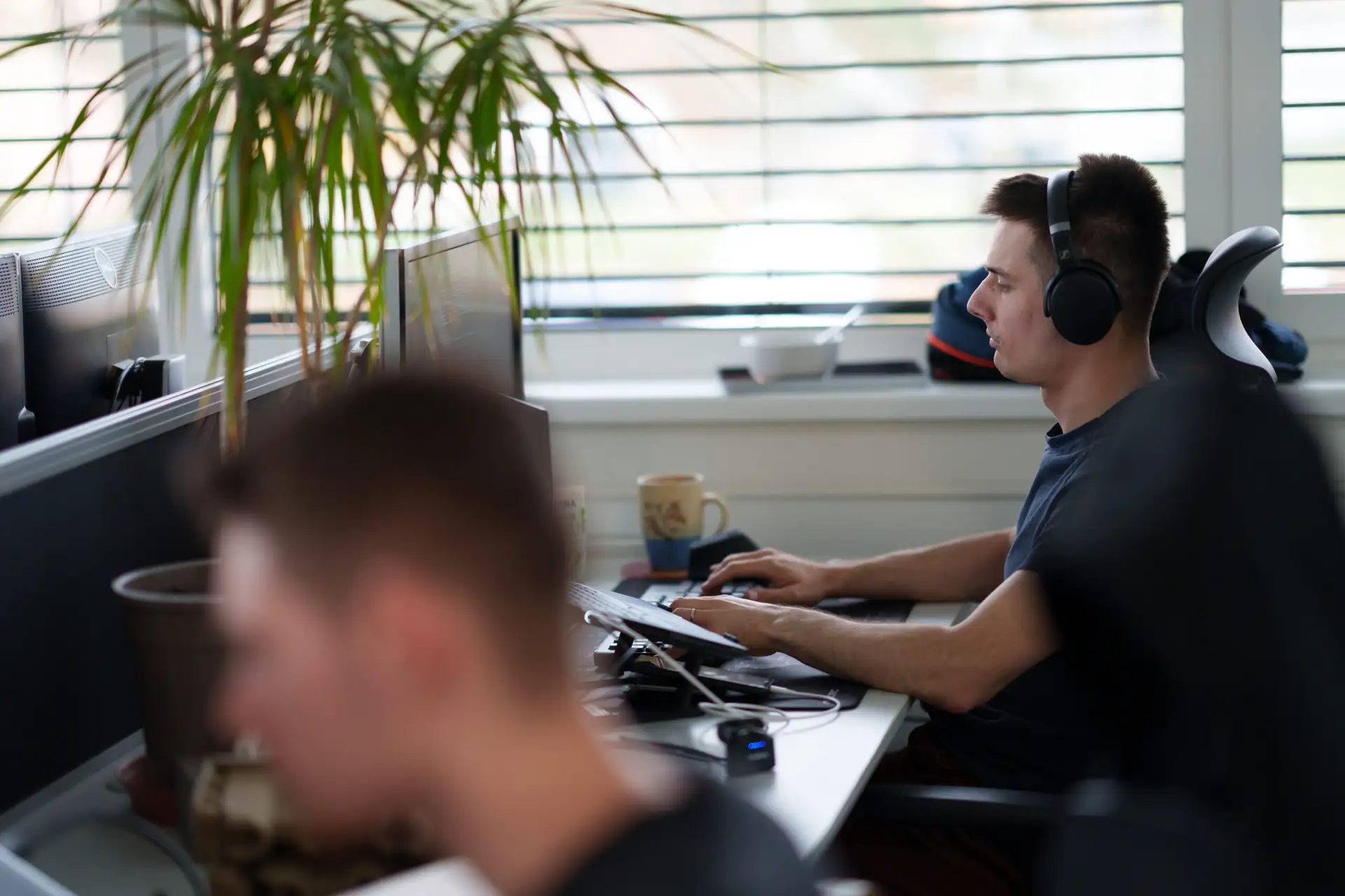 profiq engineer in a team workspace