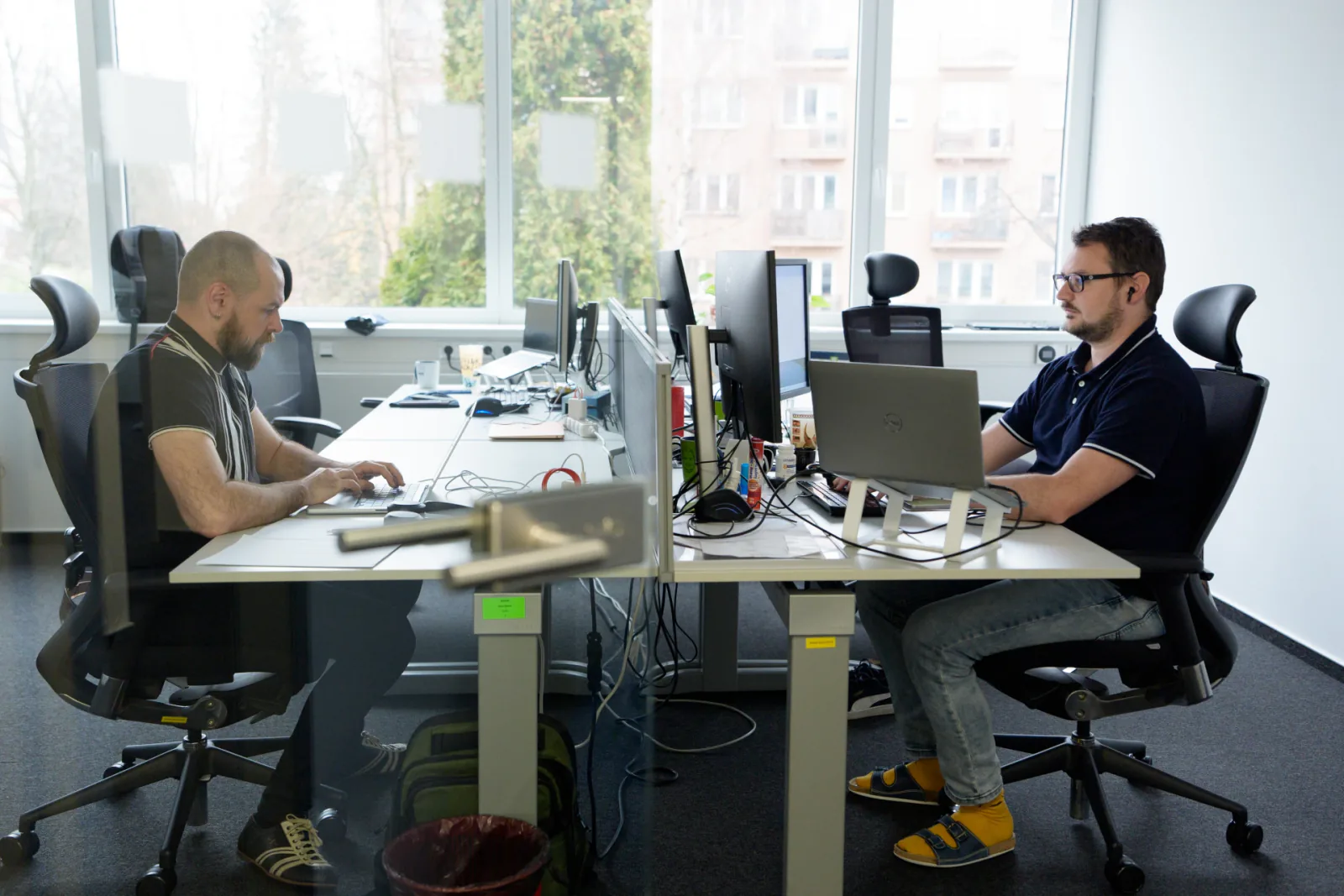 profiq teammates collaborating at a table